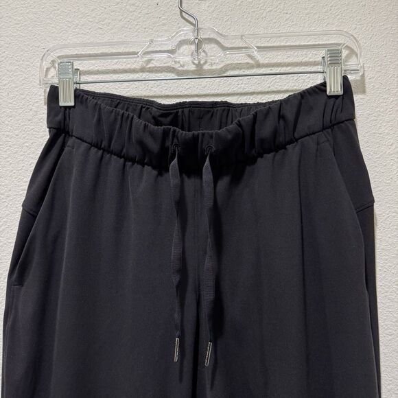 Lululemon On The Fly Jogger Pants Womens Sz 4 Black Tapered Leg Drawstring - Picture 3 of 7